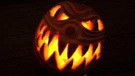 Scary 3d carved pumpkin with spooky clown face